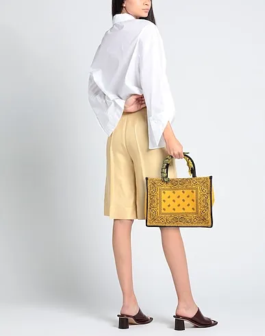 https://images.styletyx.com/images/yellow-canvas-handbag-anita-bilardi-874824351_3.webp