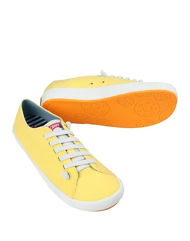 https://images.styletyx.com/images/yellow-canvas-sneakers-camper-13124315_2.webp