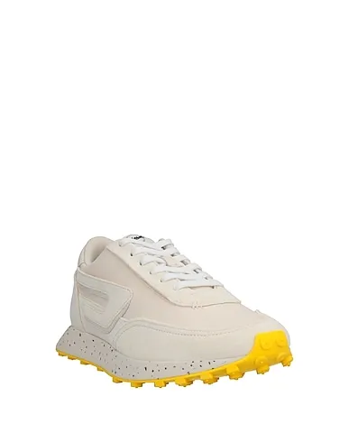 https://images.styletyx.com/images/yellow-canvas-sneakers-diesel-2257282_2.webp