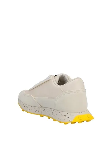 https://images.styletyx.com/images/yellow-canvas-sneakers-diesel-2257282_3.webp