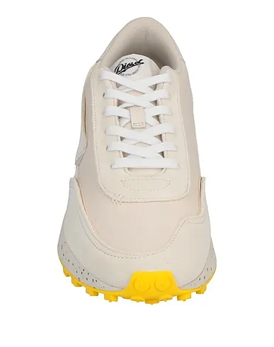 https://images.styletyx.com/images/yellow-canvas-sneakers-diesel-2257282_4.webp