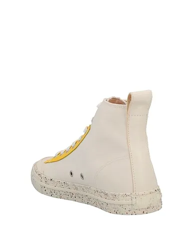 https://images.styletyx.com/images/yellow-canvas-sneakers-diesel-2257285_3.webp