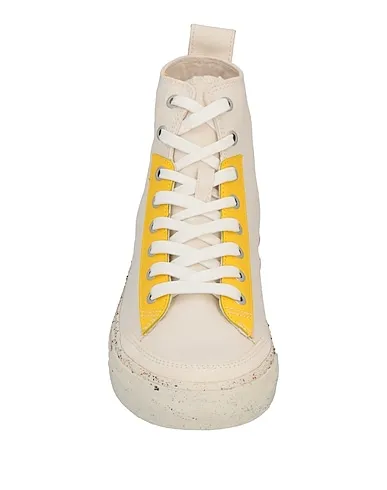 https://images.styletyx.com/images/yellow-canvas-sneakers-diesel-2257285_4.webp