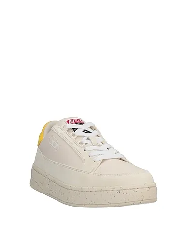 https://images.styletyx.com/images/yellow-canvas-sneakers-diesel-2257288_2.webp