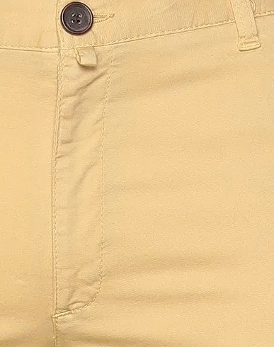 https://images.styletyx.com/images/yellow-cotton-twill-casual-pants-barbour-948419_4.webp