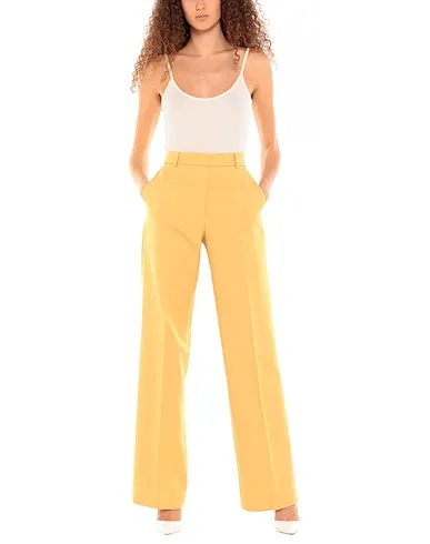 https://images.styletyx.com/images/yellow-cotton-twill-casual-pants-stella-mccartney-2653113_2.webp