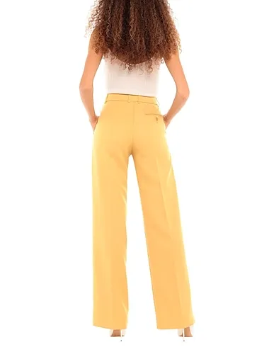 https://images.styletyx.com/images/yellow-cotton-twill-casual-pants-stella-mccartney-2653113_3.webp