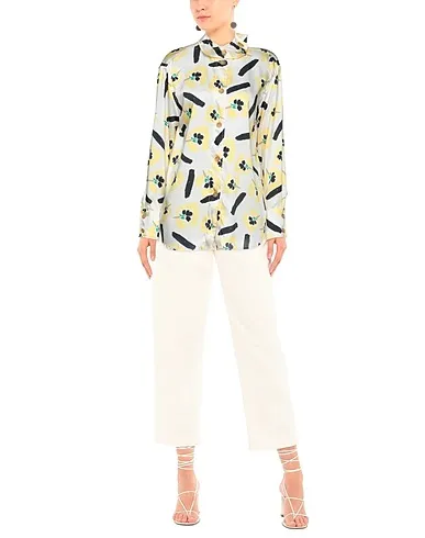https://images.styletyx.com/images/yellow-cotton-twill-floral-shirts-blouses-rejina-pyo-1331364_2.webp