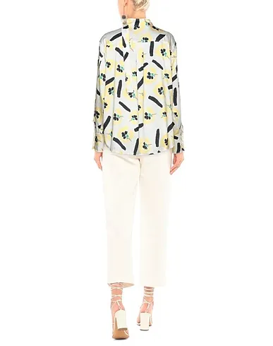 https://images.styletyx.com/images/yellow-cotton-twill-floral-shirts-blouses-rejina-pyo-1331364_3.webp