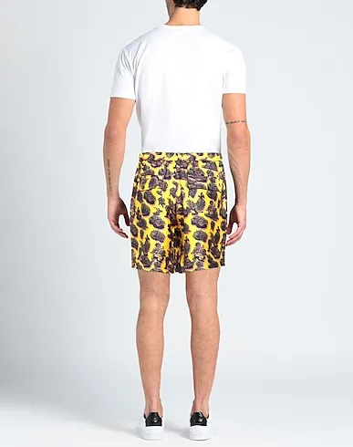 https://images.styletyx.com/images/yellow-cotton-twill-shorts-bermuda-stella-mccartney-men-13086786_3.webp