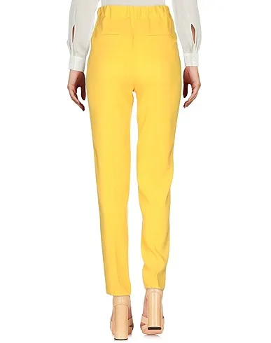 https://images.styletyx.com/images/yellow-crepe-casual-pants-alberto-biani-2999975_3.webp