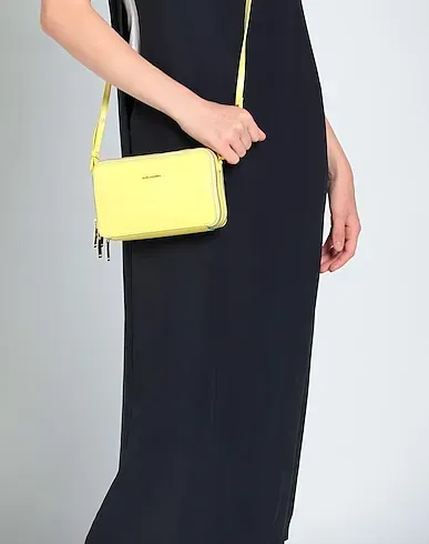 https://images.styletyx.com/images/yellow-cross-body-bags-piquadro-2956116_3.webp