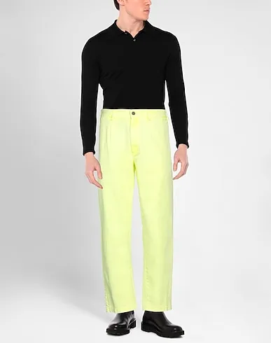 https://images.styletyx.com/images/yellow-denim-denim-pants-palm-angels-2923976_2.webp