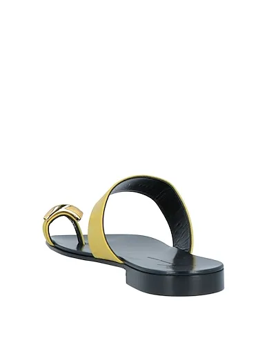 https://images.styletyx.com/images/yellow-leather-flip-flops-giuseppe-zanotti-1048439517_3.webp