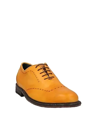 https://images.styletyx.com/images/yellow-leather-laced-shoes-richard-owe-n-8721742_2.webp