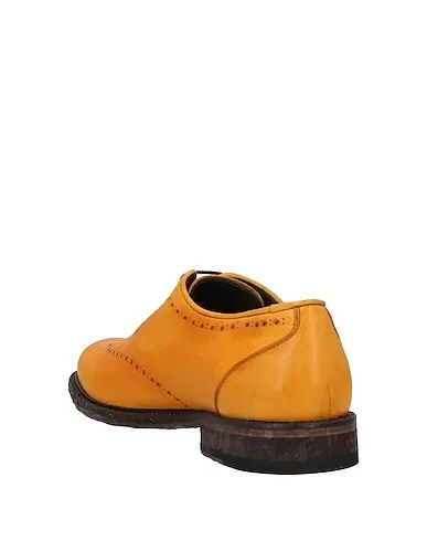 https://images.styletyx.com/images/yellow-leather-laced-shoes-richard-owe-n-8721742_3.webp