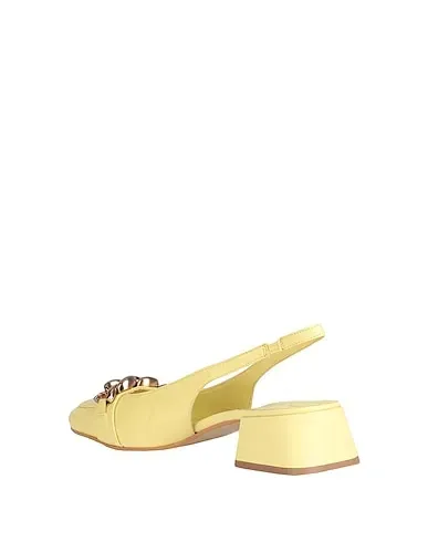 https://images.styletyx.com/images/yellow-leather-pump-bruno-premi-13443264_3.webp