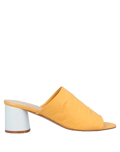 https://images.styletyx.com/images/yellow-leather-sandals-carlo-pazolini-1353291_1.webp
