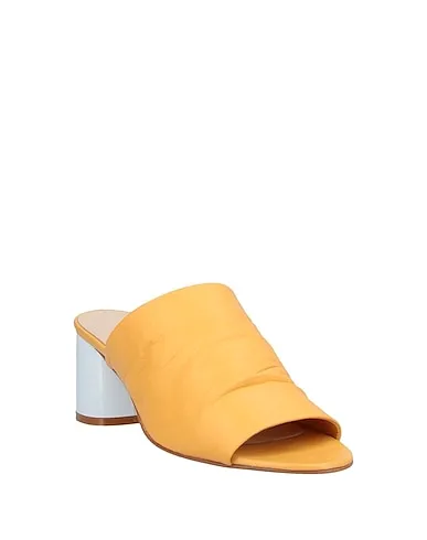 https://images.styletyx.com/images/yellow-leather-sandals-carlo-pazolini-1353291_2.webp