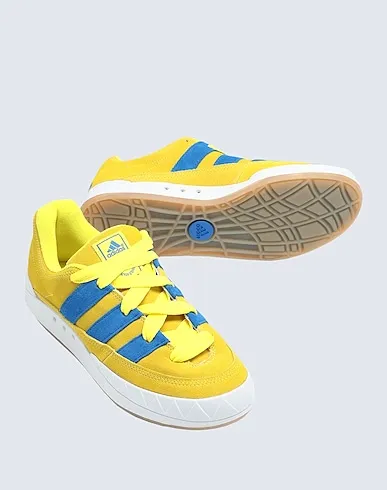https://images.styletyx.com/images/yellow-leather-sneakers-adimatic-adidas-13502339_2.webp