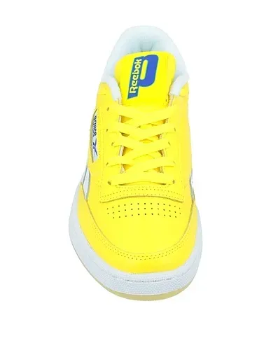 https://images.styletyx.com/images/yellow-leather-sneakers-reebok-2509590_4.webp