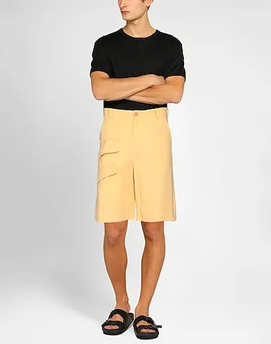 https://images.styletyx.com/images/yellow-plain-weave-shorts-bermuda-jacquemus-2659020_2.webp
