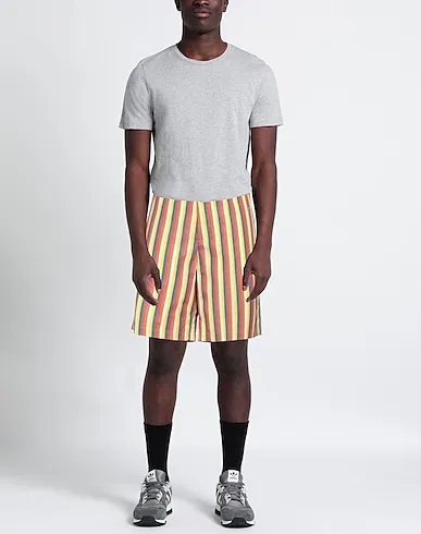 https://images.styletyx.com/images/yellow-plain-weave-shorts-bermuda-jil-sander-13025151_2.webp