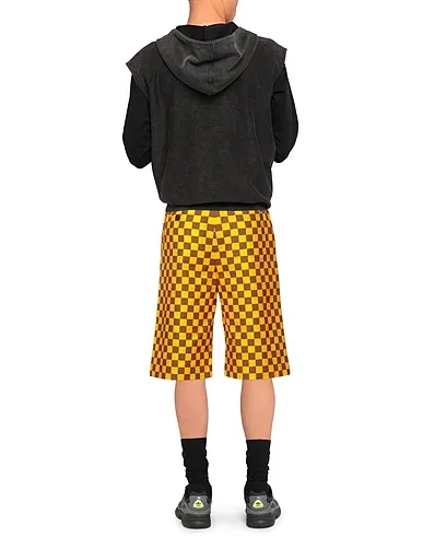 https://images.styletyx.com/images/yellow-plain-weave-shorts-bermuda-jw-anderson-1379208_3.webp