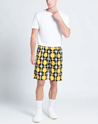 https://images.styletyx.com/images/yellow-plain-weave-shorts-bermuda-marcelo-burlon-13263689_2.webp