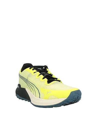 https://images.styletyx.com/images/yellow-plain-weave-sneakers-puma-711424013_2.webp
