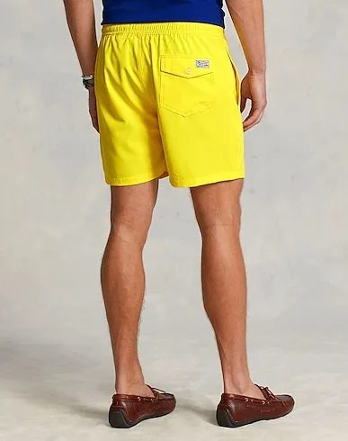 https://images.styletyx.com/images/yellow-swim-shorts-5-5-inch-traveler-swim-trunk-ralph-lauren-1939991227_3.webp