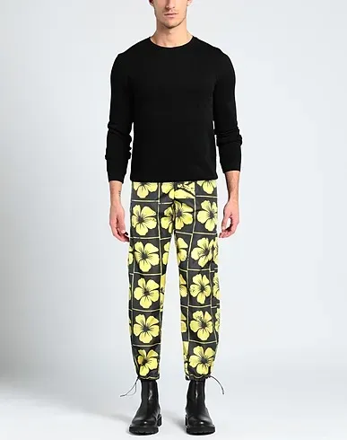 https://images.styletyx.com/images/yellow-techno-fabric-casual-pants-palm-angels-243498019_2.webp