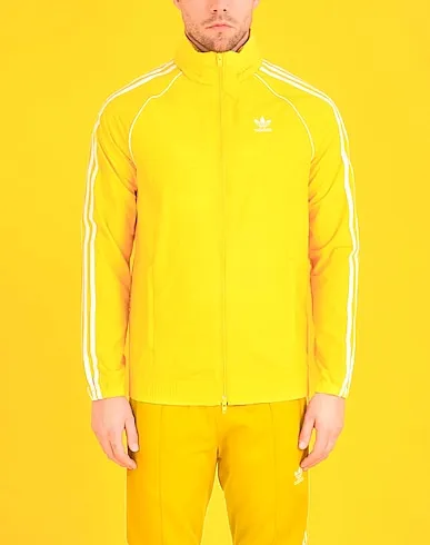 https://images.styletyx.com/images/yellow-techno-fabric-jacket-sst-windbreaker-adidas-12910488_2.webp
