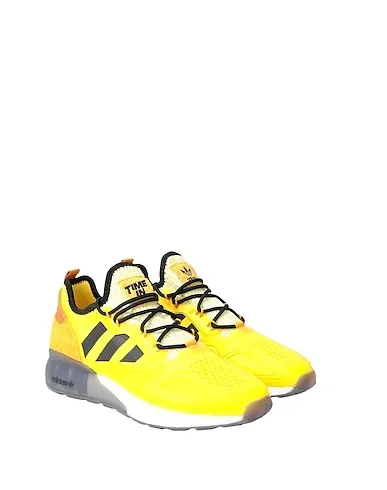 https://images.styletyx.com/images/yellow-techno-fabric-sneakers-ninja-zx-2k-boost-adidas-999387869_2.webp
