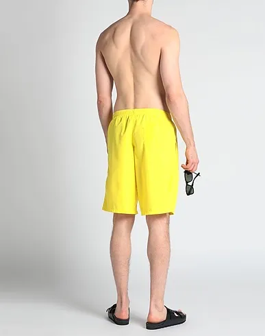 https://images.styletyx.com/images/yellow-techno-fabric-swim-shorts-love-moschino-1004002427_3.webp