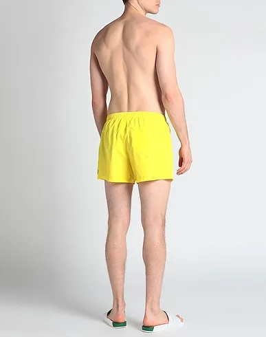 https://images.styletyx.com/images/yellow-techno-fabric-swim-shorts-love-moschino-1010899153_3.webp