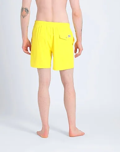 https://images.styletyx.com/images/yellow-techno-fabric-swim-shorts-ralph-lauren-1572204251_3.webp