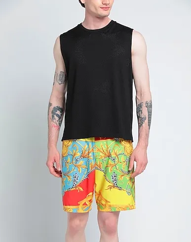 https://images.styletyx.com/images/yellow-techno-fabric-swim-shorts-versace-1047042186_2.webp