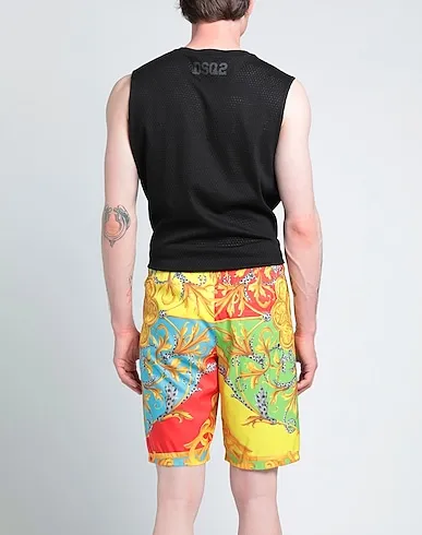 https://images.styletyx.com/images/yellow-techno-fabric-swim-shorts-versace-1047042186_3.webp