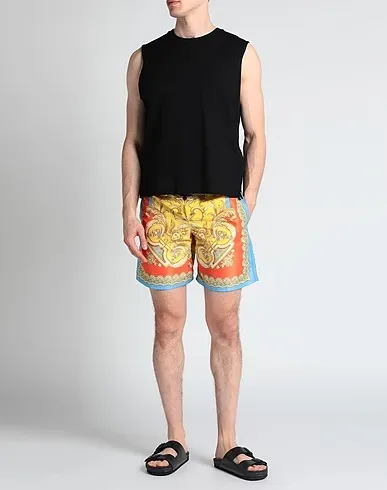 https://images.styletyx.com/images/yellow-techno-fabric-swim-shorts-versace-13304998_2.webp