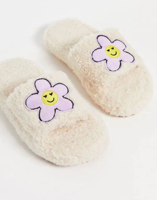 https://images.styletyx.com/images/zahra-chunky-floral-slider-slippers-in-teddy-asos-design-2398051_1.webp